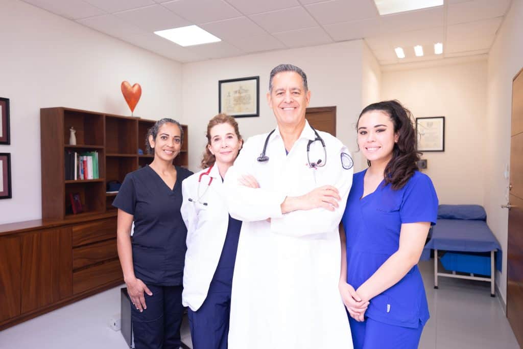 pexels photo 8460371 8460371 Group of diverse healthcare professionals in a clinical setting, showcasing teamwork and care.
